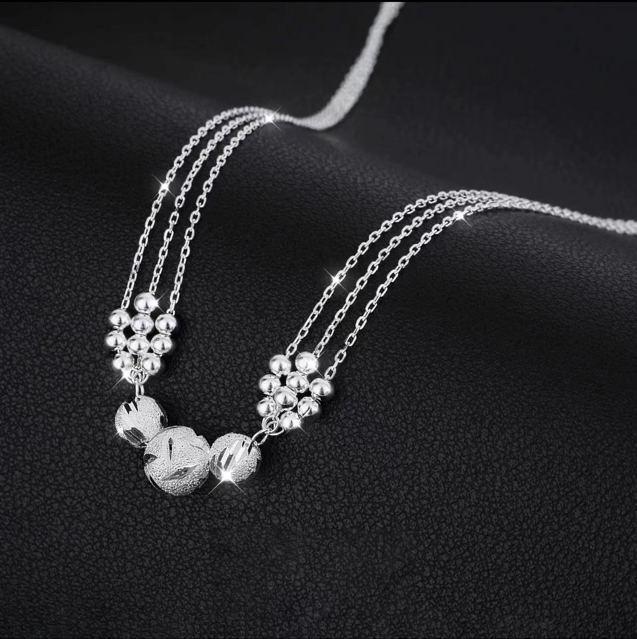 Estrella Fugaz™ Conjunto de joyas con collar de plata grabado con transferencia.