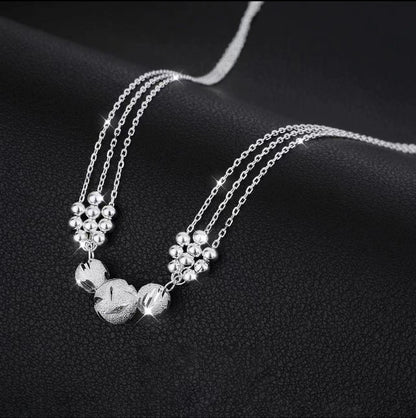 Estrella Fugaz™ Conjunto de joyas con collar de plata grabado con transferencia.