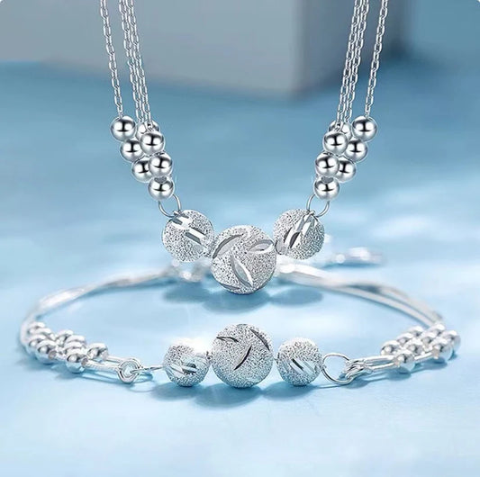 Estrella Fugaz™ Conjunto de joyas con collar de plata grabado con transferencia.