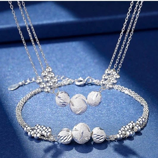 Estrella Fugaz™ Conjunto de joyas con collar de plata grabado con transferencia.