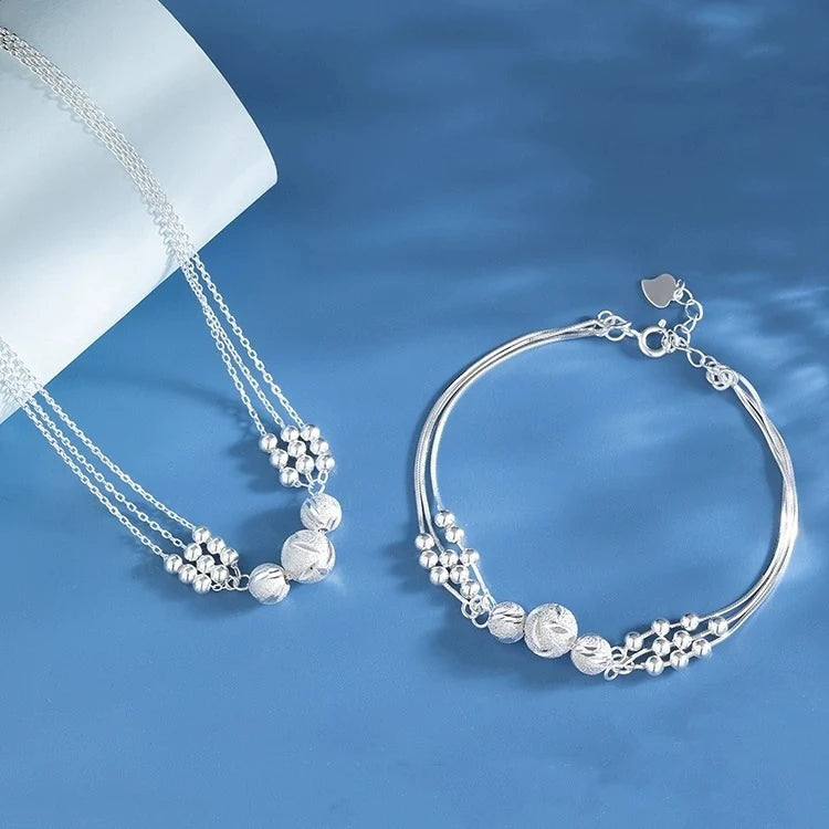 Estrella Fugaz™ Conjunto de joyas con collar de plata grabado con transferencia.